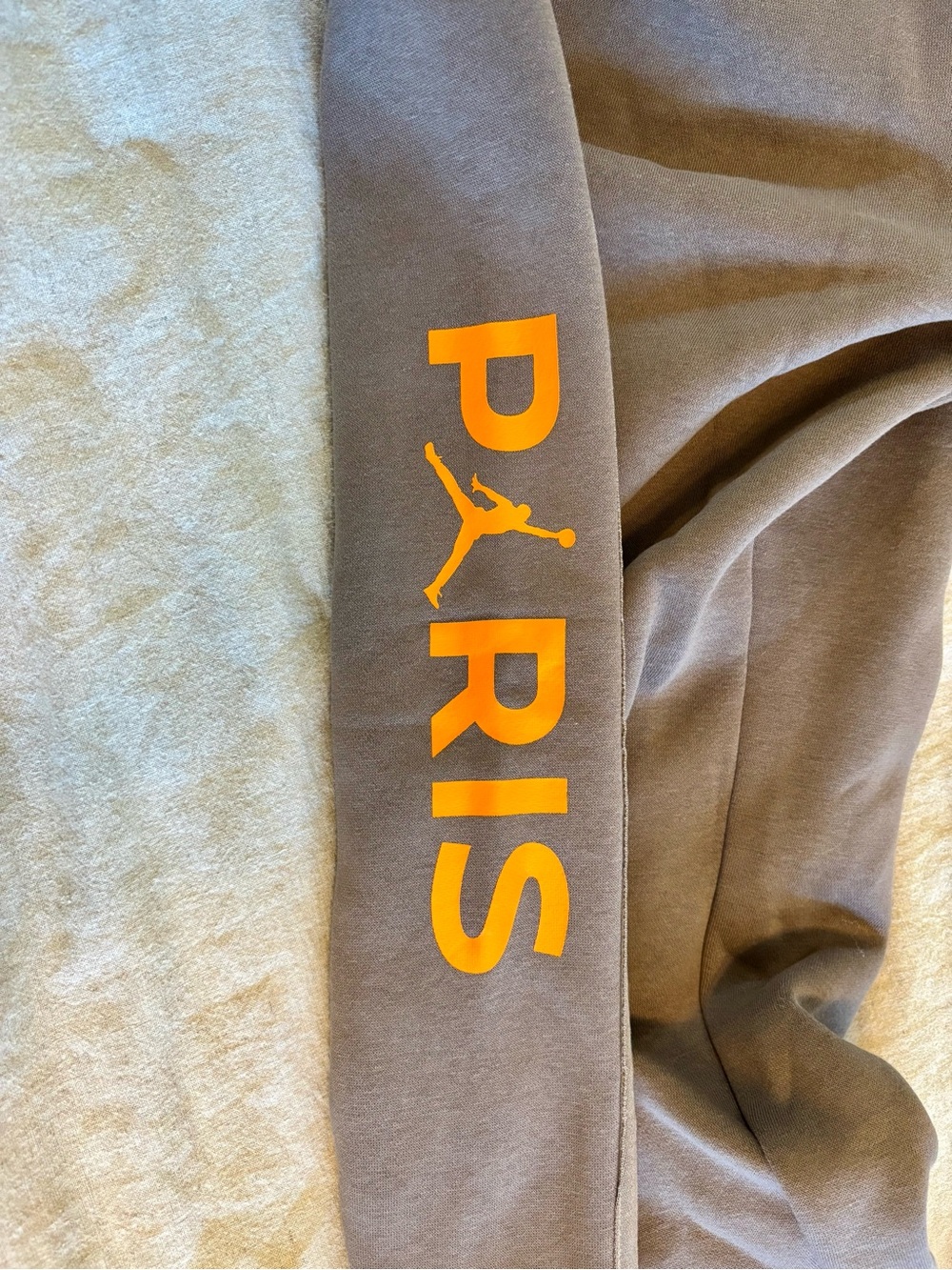 Jordan x Paris St. Germain Brown Joggers with Orange PARIS Print